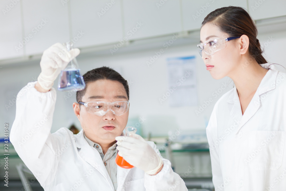 people working at laboratory people working at laboratory