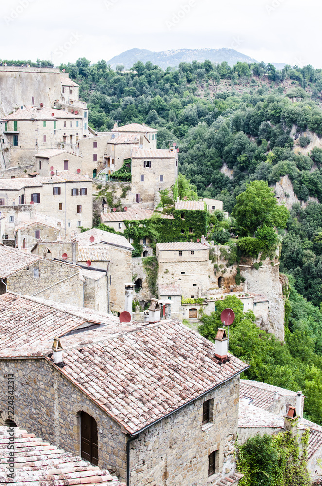 Sorano, Grosseto, Tuscany, Italy. Small medieval town of stone houses. The village is on a hill surrounded by forests