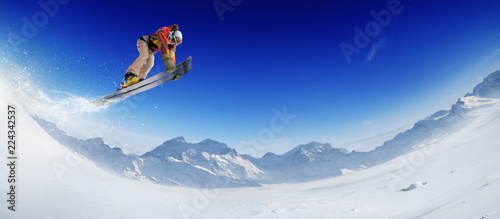 Skiing. Jumping skier. Extreme winter sports.