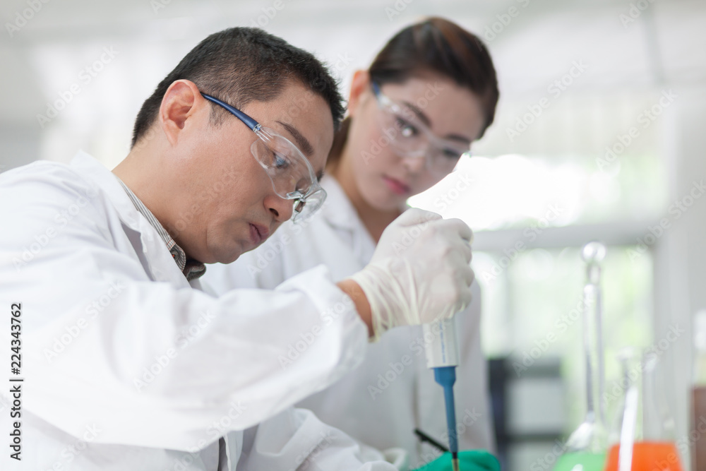 people working at laboratory people working at laboratory