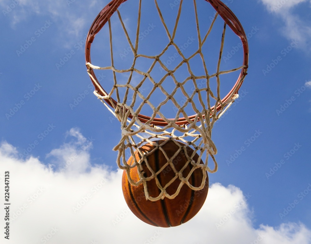 Basketball Going Into A Net
