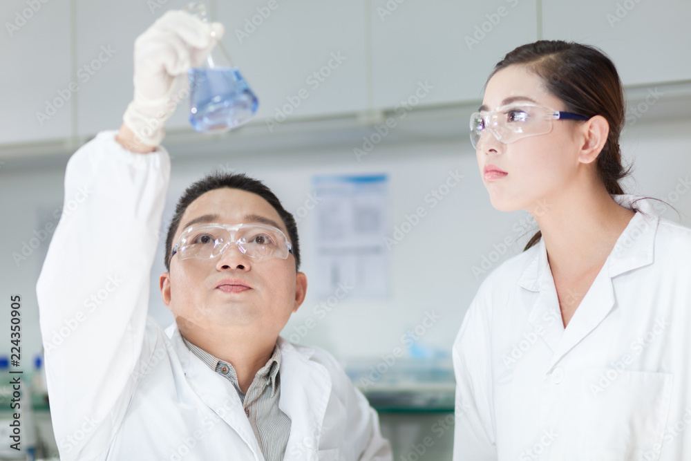 people working at laboratory people working at laboratory