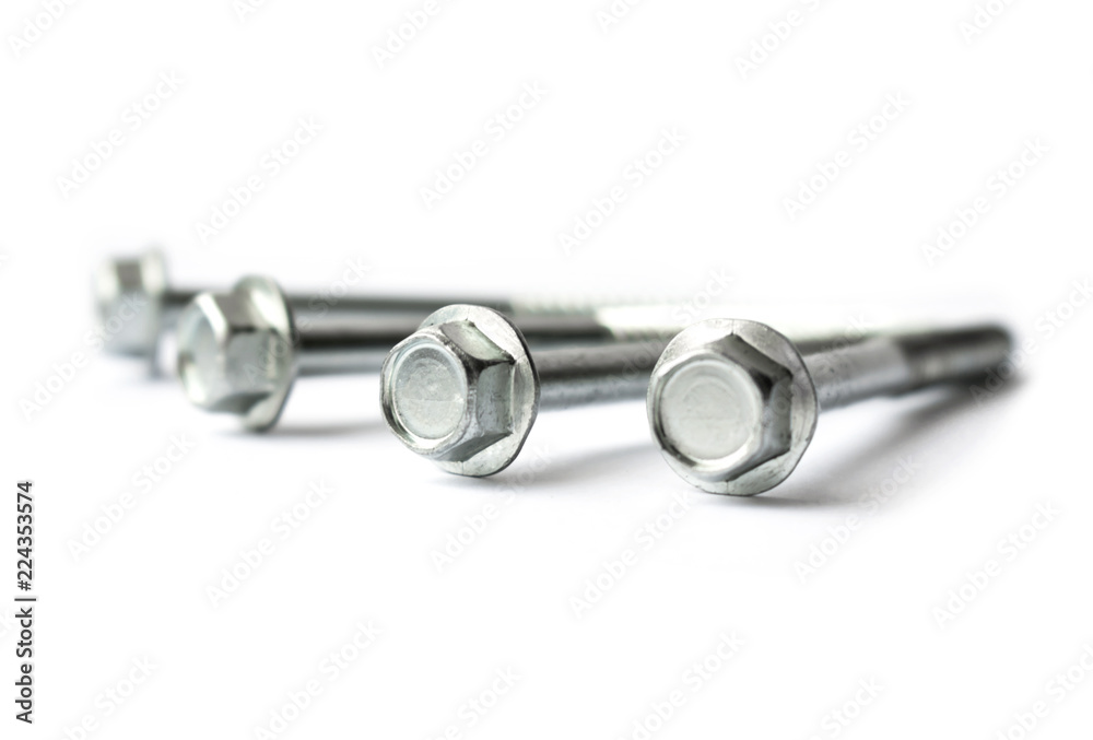 The selective focus of screw bolt plain white background The selective focus of screw bolt plain white background