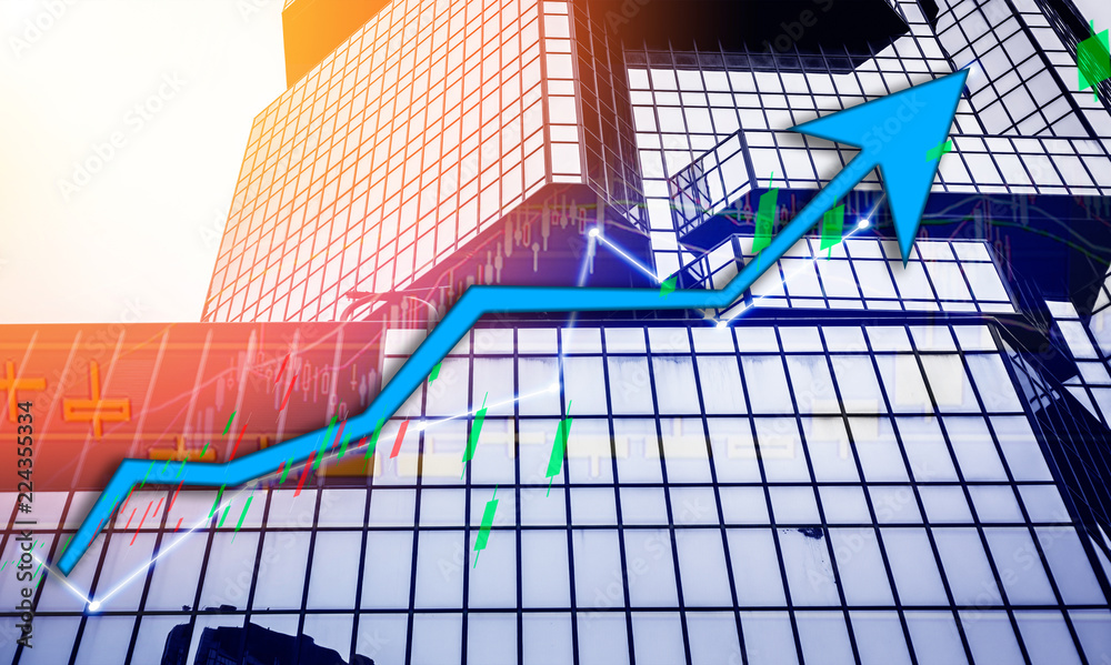 Fototapeta premium Hong Kong Office buildings with graph index (blue bull chart) of stock Market