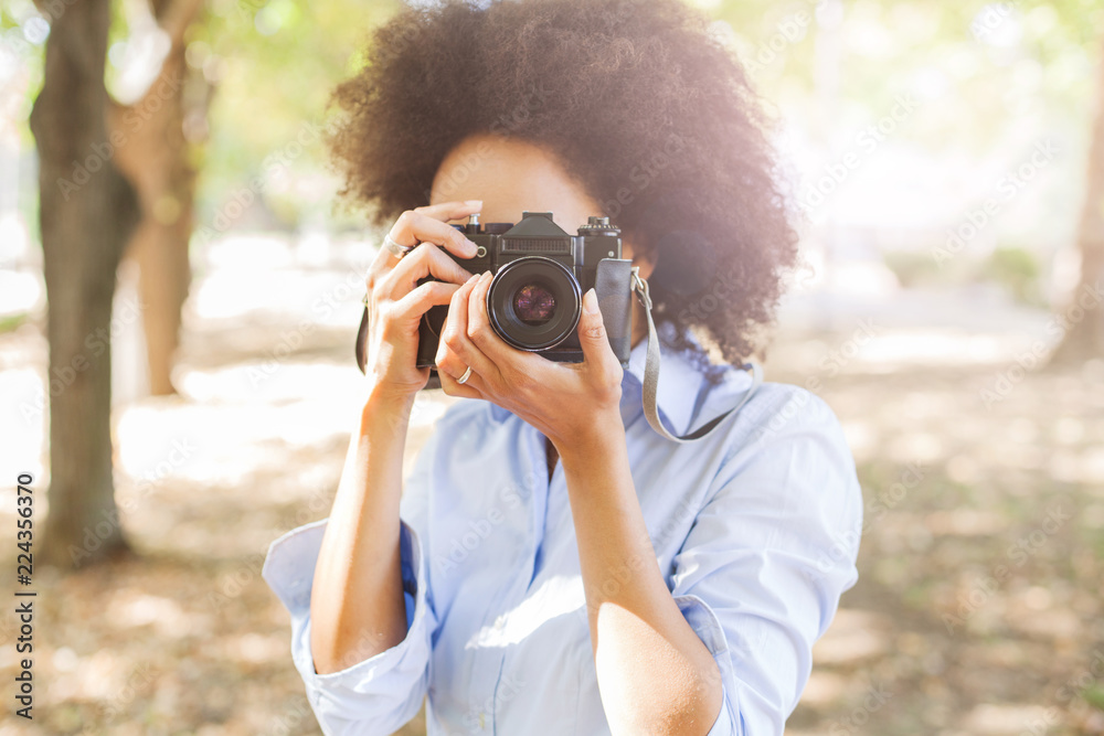 Charming Black Woman With Retro Camera In Nature