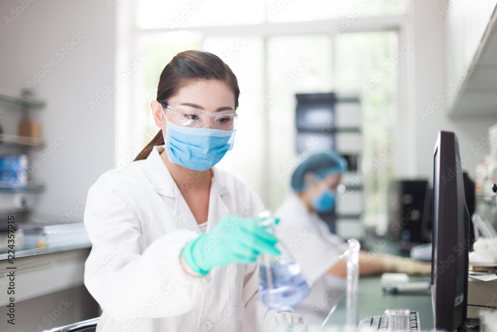 people working at laboratory people working at laboratory