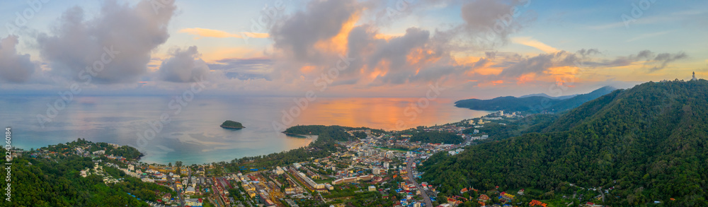 aerial panorama sunrise at Kata beach close to Karon beach in the middle of two beach has Pu island.aerial view sunrise in Chalong sea