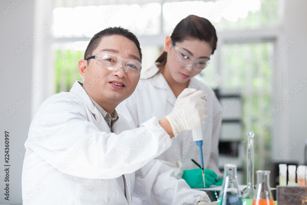 people working at laboratory people working at laboratory