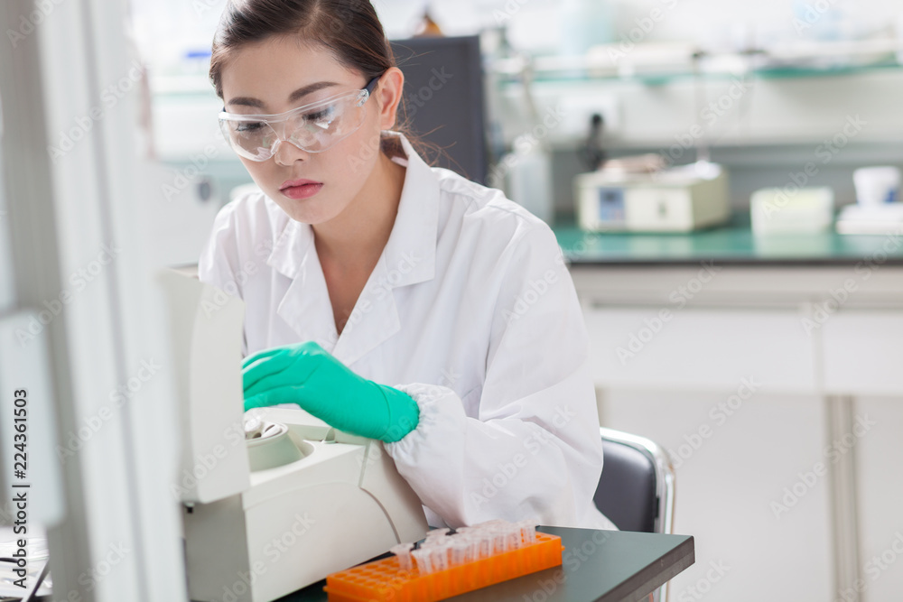 people working at laboratory people working at laboratory