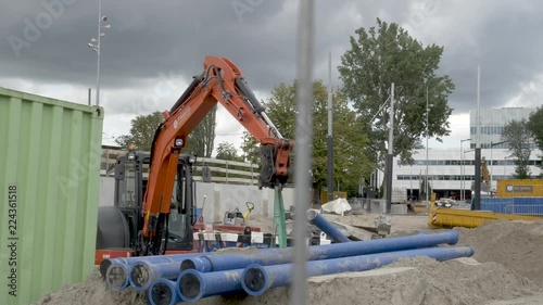 An excavator at heavy renovations at Amstel Station in Amsterdam. photo