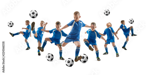 Young boy with soccer ball doing flying kick  isolated on white. football soccer players in motion on studio background. Fit jumping boy in action  jump  movement at game. Collage