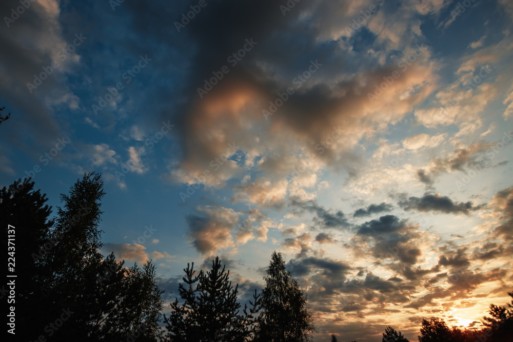 Fantastic, beautiful clouds at sunrise with dramatic light. Situation in the sky in the morning. Sunrise, landscape. copy space Fantastic, beautiful clouds at sunrise with dramatic light. Situation in the sky in the morning. Sunrise, landscape. copy space