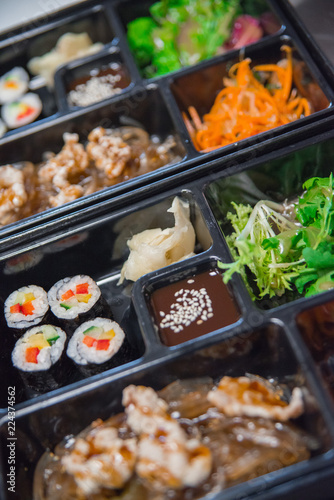 Macro picture of a bento box in a Japanese restaurant. Макро фотография бенто коробки в японском ресторане.