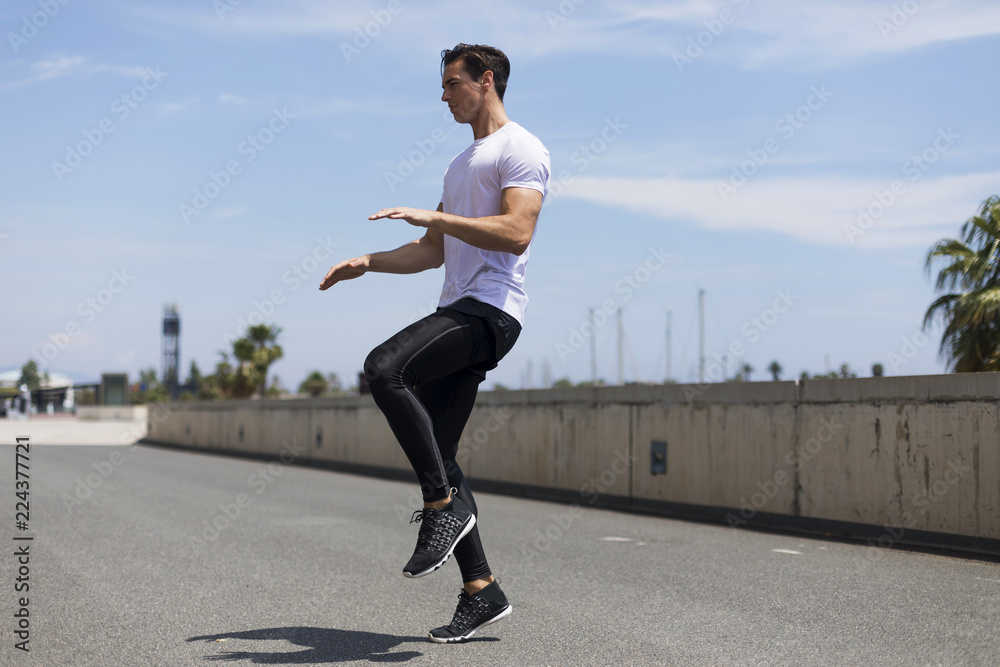 Athlete working out on cross fit jump outside . Athlete working out on cross fit jump outside .