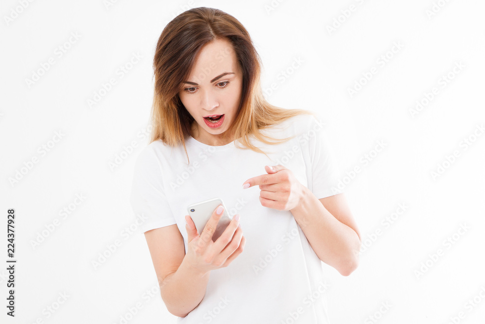 shocked look at phone, portrait surprised young girl,woman looking at smartphone seeing bad news or photos with stunned emotion on face open mouth,human reaction expression,copy space shocked look at phone, portrait surprised young girl,woman looking at smartphone seeing bad news or photos with stunned emotion on face open mouth,human reaction expression,copy space