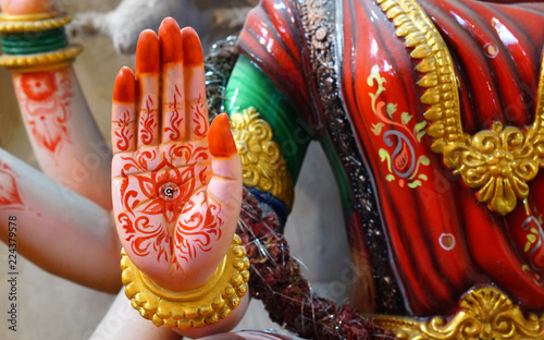  Closeup of Hand of Hindu goddess Parvati i,in blessing pose,in a temple
