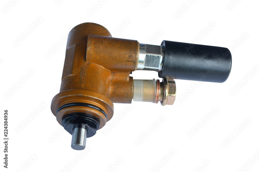 Fuel feed pump of a tractor on an isolated white background. The new spare part of the tractor. Fuel feed pump of a tractor on an isolated white background. The new spare part of the tractor.