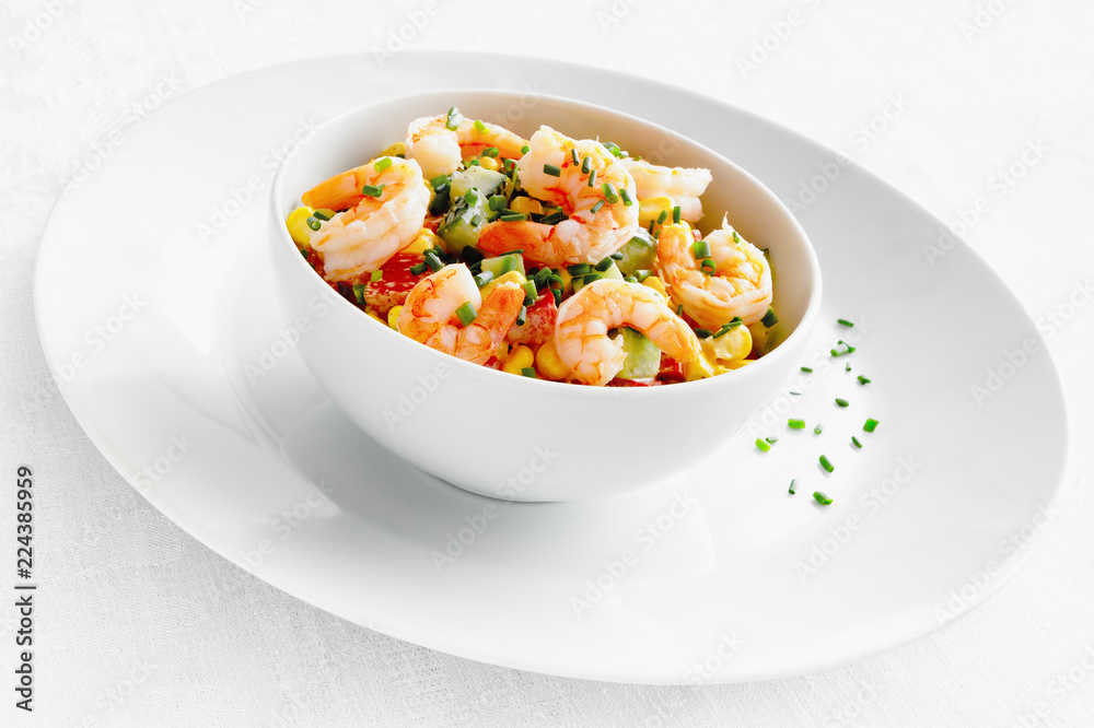 shrimps, cucumber,corn, and bell pepper salad dressed with mayonnaise and decorated with green onion