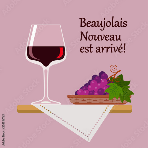 Wine glass Beaujolais Nuvo with red grapes