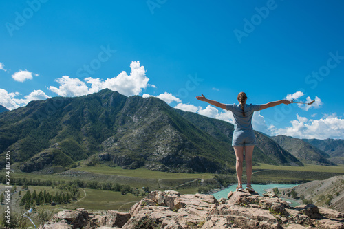 Woman taking selfie on mobi...