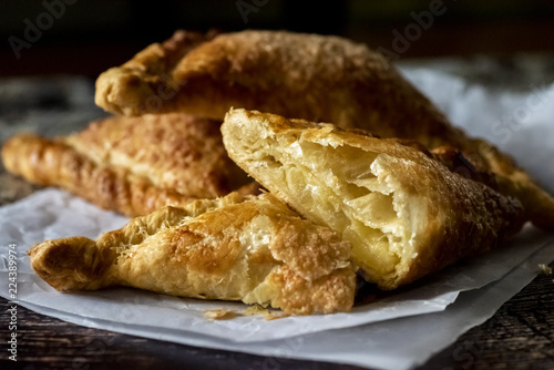 Flaky pastry laid on paper napkin