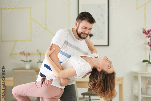 Lovely couple dancing toget...