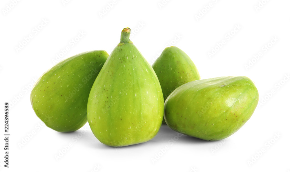 Fresh green figs isolated on white. Tropical fruit Fresh green figs isolated on white. Tropical fruit