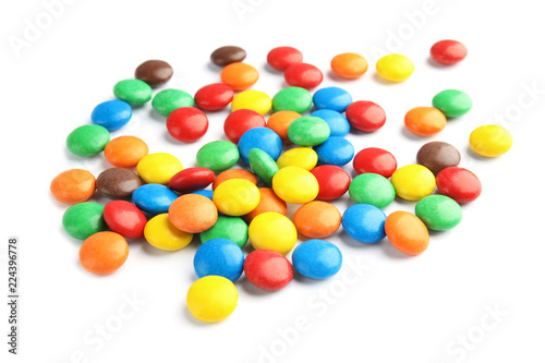 Pile of colorful candies on white background