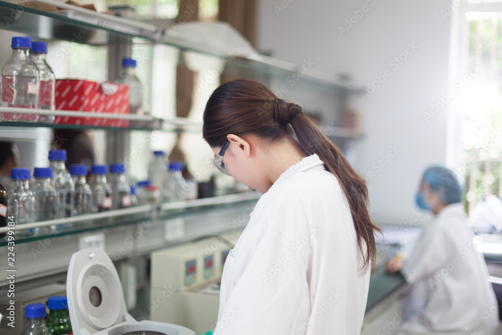 people working at laboratory people working at laboratory