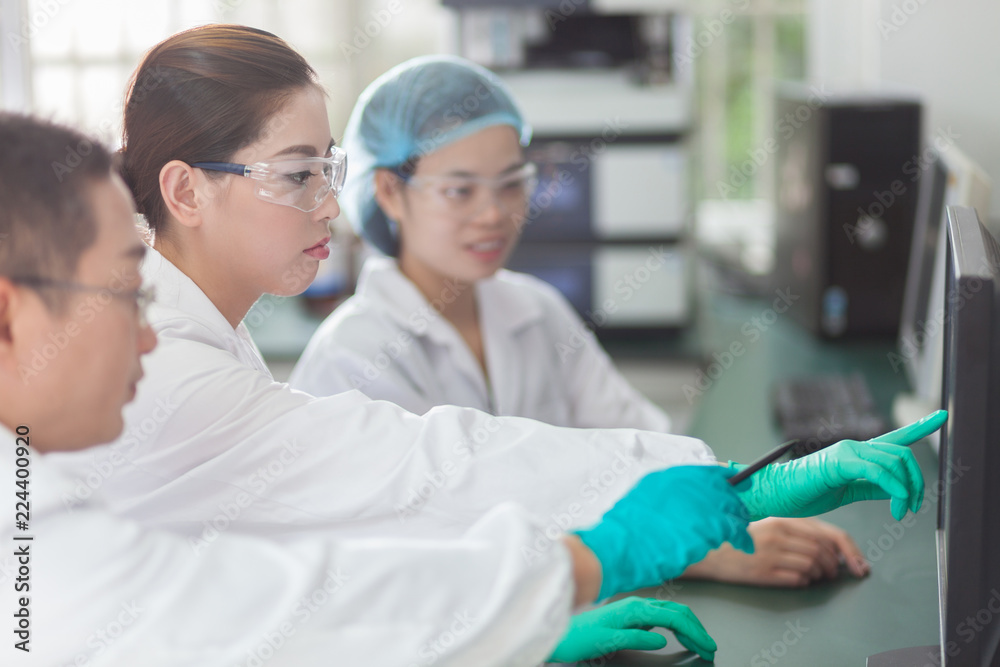 people working at laboratory people working at laboratory