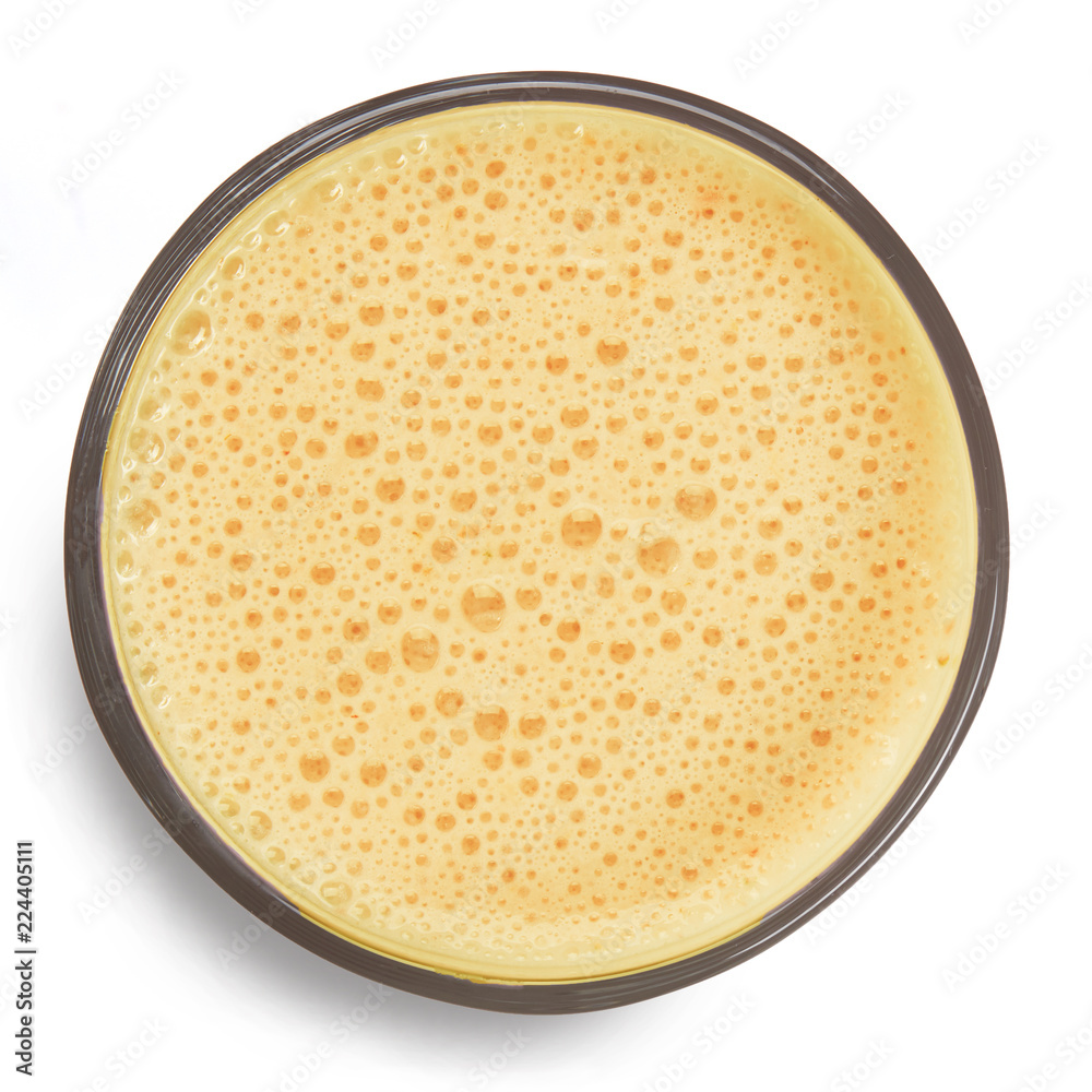 Banana milkshake top view isolated on white Banana milkshake top view isolated on white