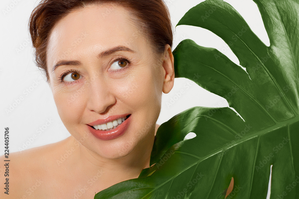 Beauty wrinkle middle age woman face portrait. Spa and anti aging concept Isolated on white background. Plastic surgery and collagen face injections. Wrinkles and menopause. Copy space Beauty wrinkle middle age woman face portrait. Spa and anti aging concept Isolated on white background. Plastic surgery and collagen face injections. Wrinkles and menopause. Copy space