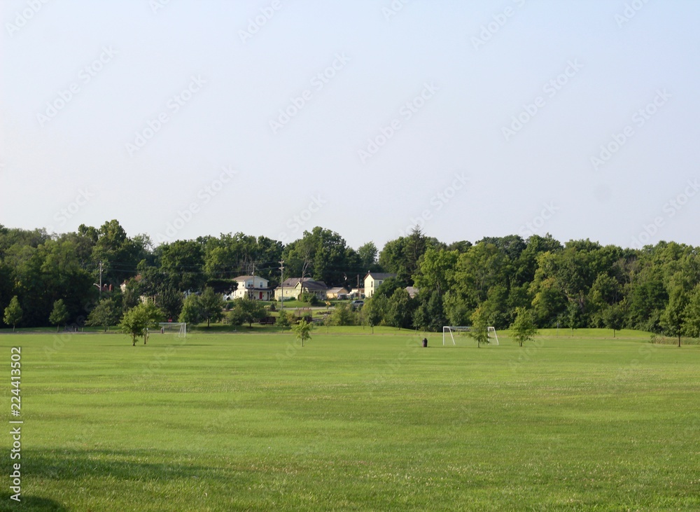 The grass soccer fields at the sports complex in the park. The grass soccer fields at the sports complex in the park.