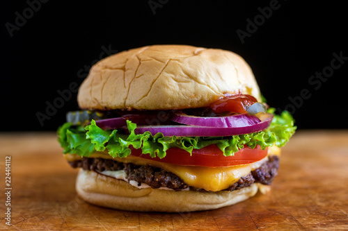 Close up of burger on wooden table