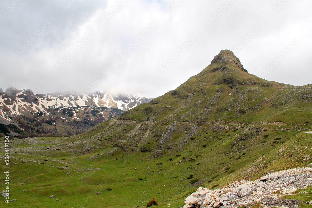 Mountains ,valley, snow,springtime , Wild untouched nature beauty. Peaceful place in nature, Relax, mind reset concept. Durmitor Montenegro. Mountains ,valley, snow,springtime , Wild untouched nature beauty. Peaceful place in nature, Relax, mind reset concept. Durmitor Montenegro.