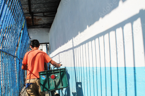 man walking off ferry from regla to havana in cuba photo