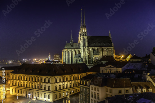 The Cathedral of Saints Peter and Paul is situated on the Petrov hill in the center of the city of Brno in the Czech Republic during a dramatic sunset captured from a beautiful view from the highest p