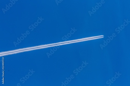 Blue Sky with Airplane Trail