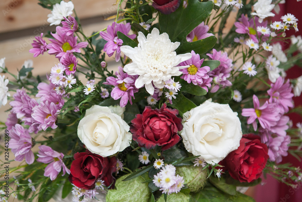 Beautiful wedding flower decoration with red and white roses blossom