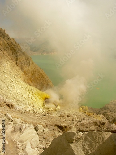 view on the acidic crater lake of the Ijen volcano in Java Indonesia, a sulfur mine and toxic gaz