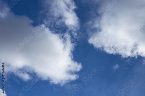 white clouds on blue sky