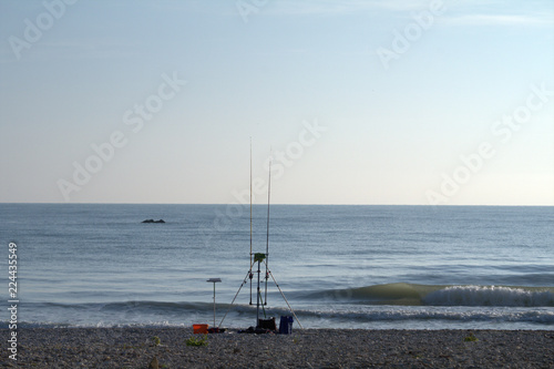 fishing on the beach,sea,horizon,sky,summer,wave