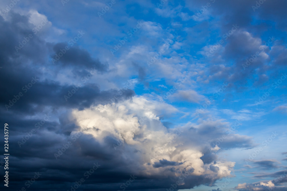 a great storm cloud on a blue autumn sky