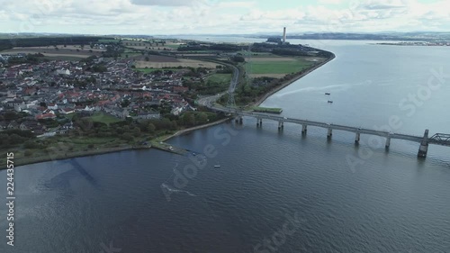 Aerial footage of traffic crossing Kincardine Bridge over the River Forth. photo