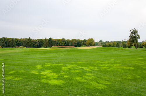 Golf course with green grass