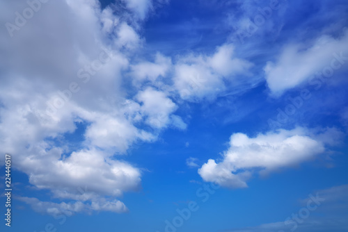 Blue sky white summer cumulus clouds