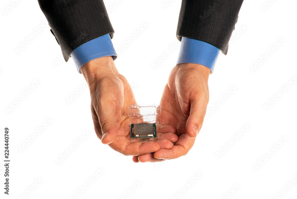 Fototapeta premium CPU device in the hands, isolated on a white