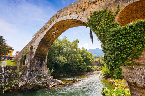 Cangas de Onis roman bridge in Asturias Spain photo