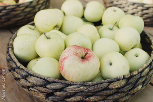 Fresh organic apples on seasonal farmer`s market, fruit harvest,   autumn fest, selective focus