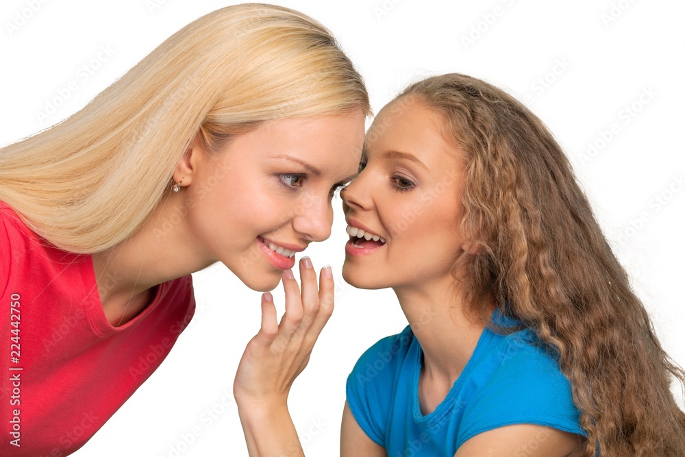 Portrait of Two Girlfriends / Sisters Gossiping Portrait of Two Girlfriends / Sisters Gossiping